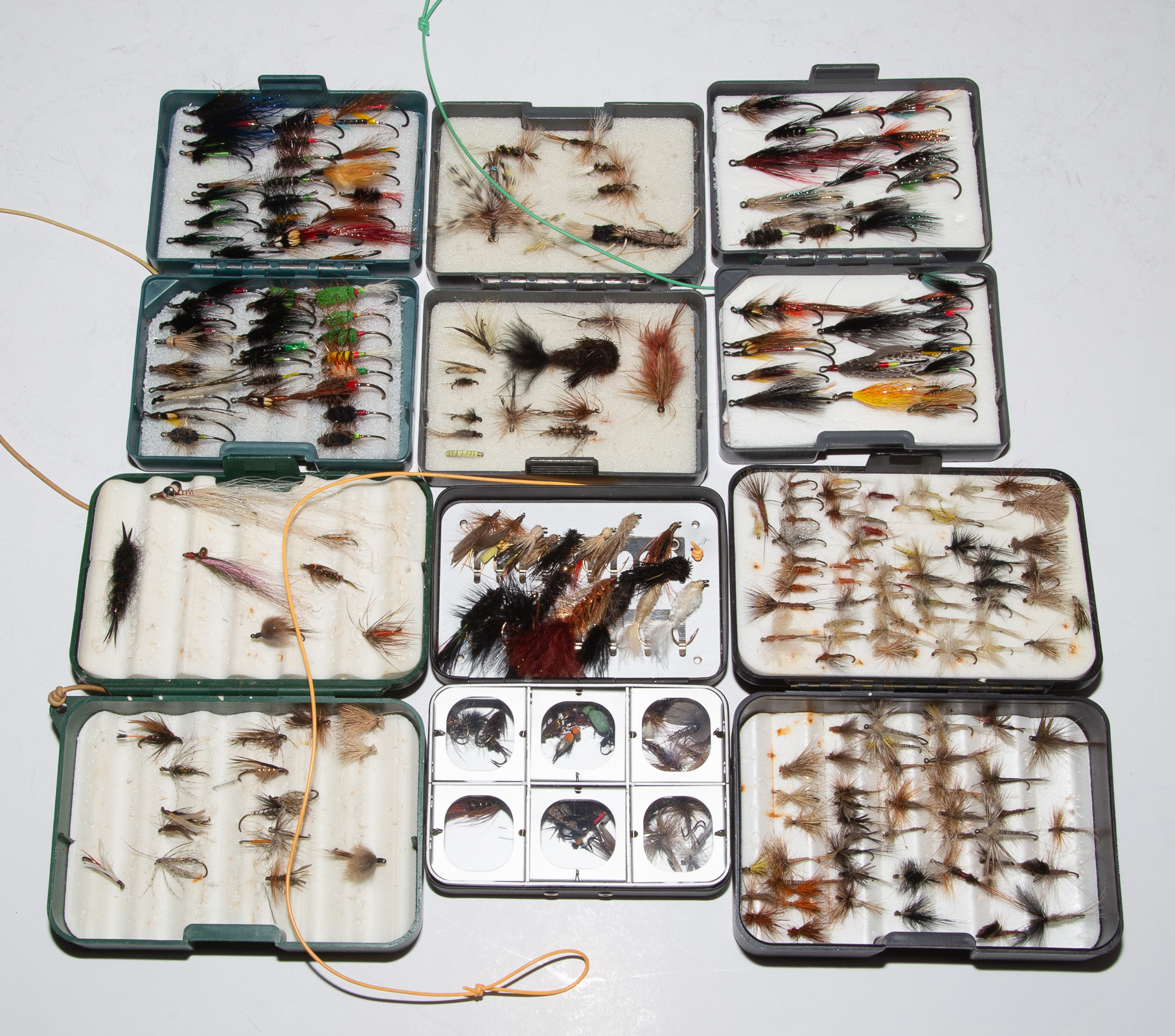 Appraisal: COLLECTION OF HAND-TIED TROUT FISHING FLIES Housed in six field