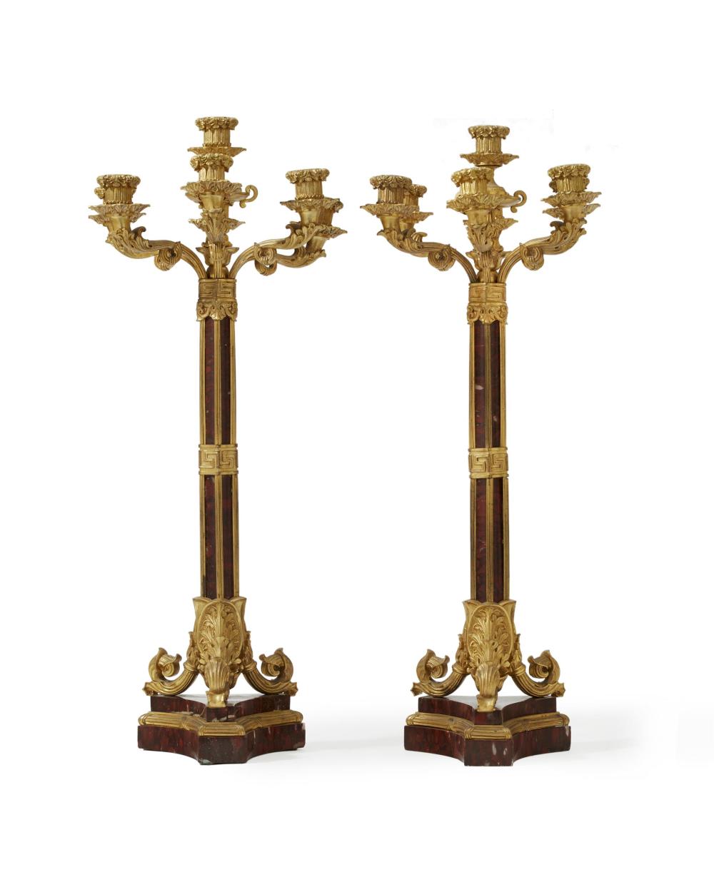 Appraisal: A pair of French gilt-bronze and rouge marble candelabra Third-quarter