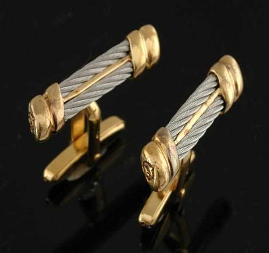 Appraisal: A pair of cufflinks by Charriol Each cufflink set with