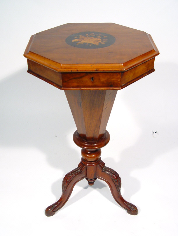 Appraisal: Victorian octagonal walnut trumpet shaped sewing table the top inlaid