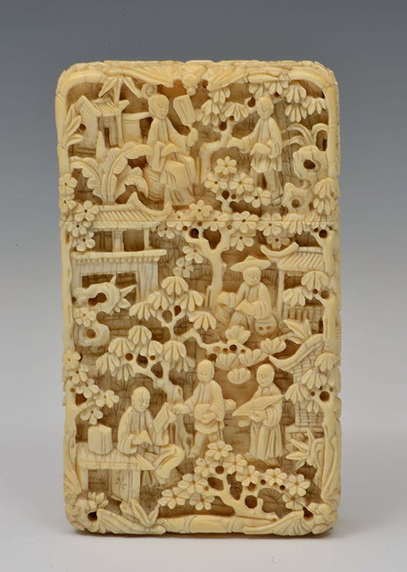 Appraisal: A CHINESE CANTON CARVED IVORY CARD CASE figures crossing a