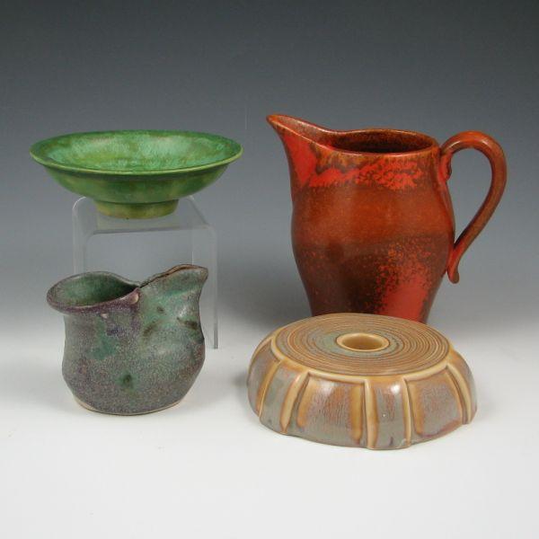 Appraisal: Four pottery pieces including the following Footed bowl with very