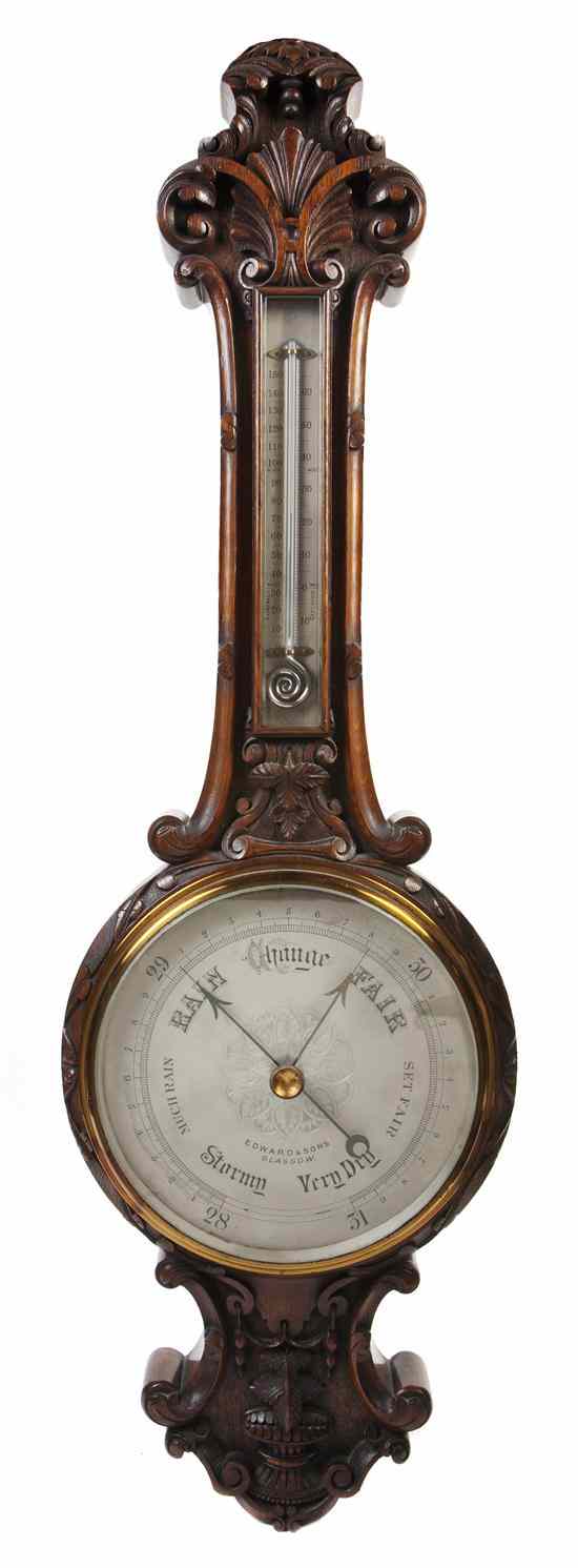 Appraisal: A Scottish Carved Mahogany Wheel Barometer Edward Sons Glasgow having