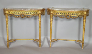 Appraisal: A pair of Neo Classical style giltwood demi-lune pier tables