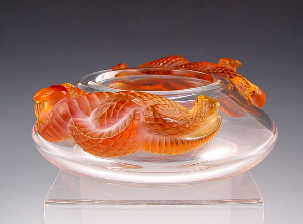 Appraisal: LALIQUE FRENCH CRYSTAL SERPENT BOWL Two color Lalique amber serpents