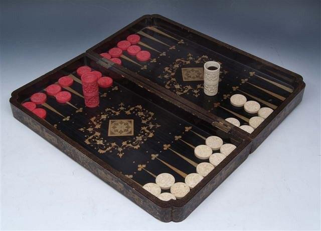 Appraisal: A CHINESE IVORY CHESS SET white and red stained the