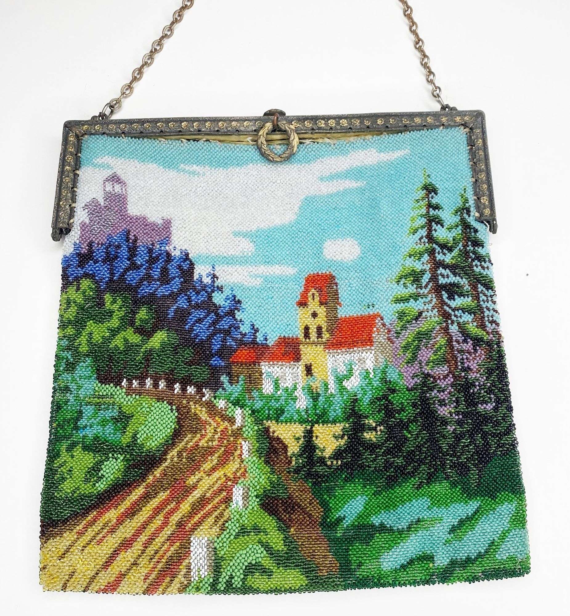 Appraisal: Micro Beaded Hand Bag with Wooded Castle Scene long at