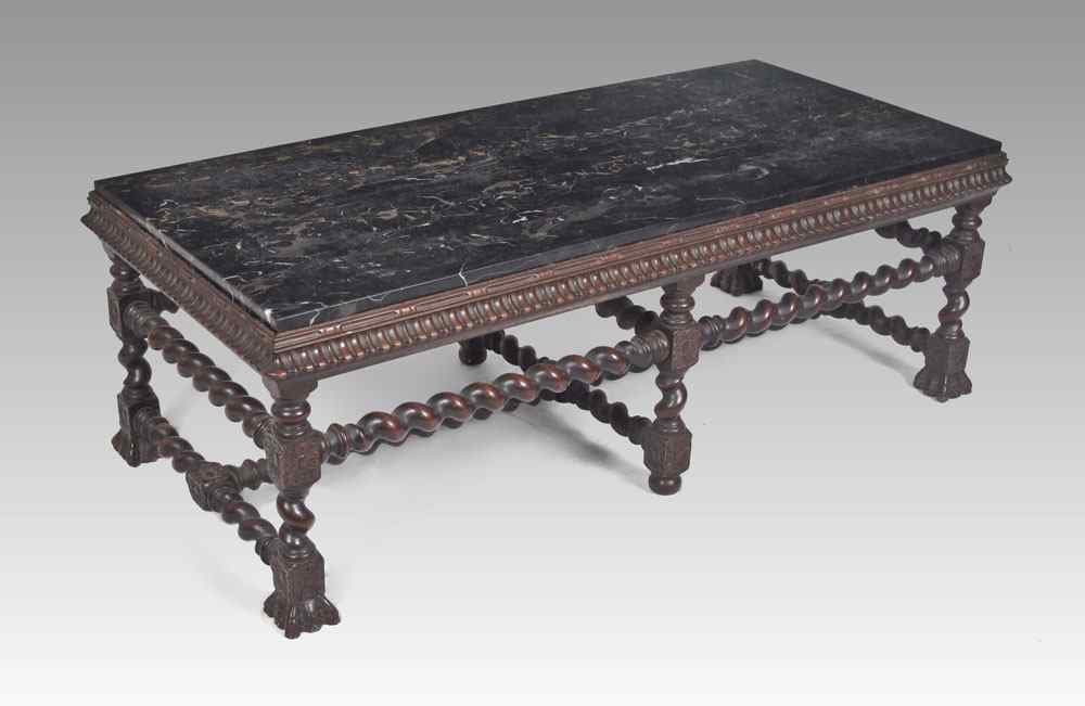 Appraisal: CARVED MARBLE TOP COFFEE TABLE Carved base with barley twist