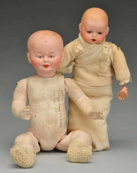 Appraisal: Lot of Rare French Bisque Character Dolls Description Baby incised