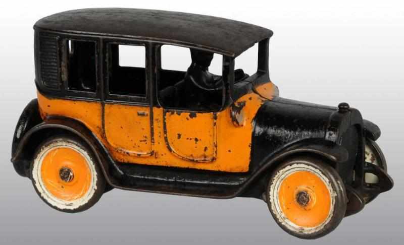 Appraisal: Cast Iron Arcade Yellow Taxi Toy Description American Original mesh