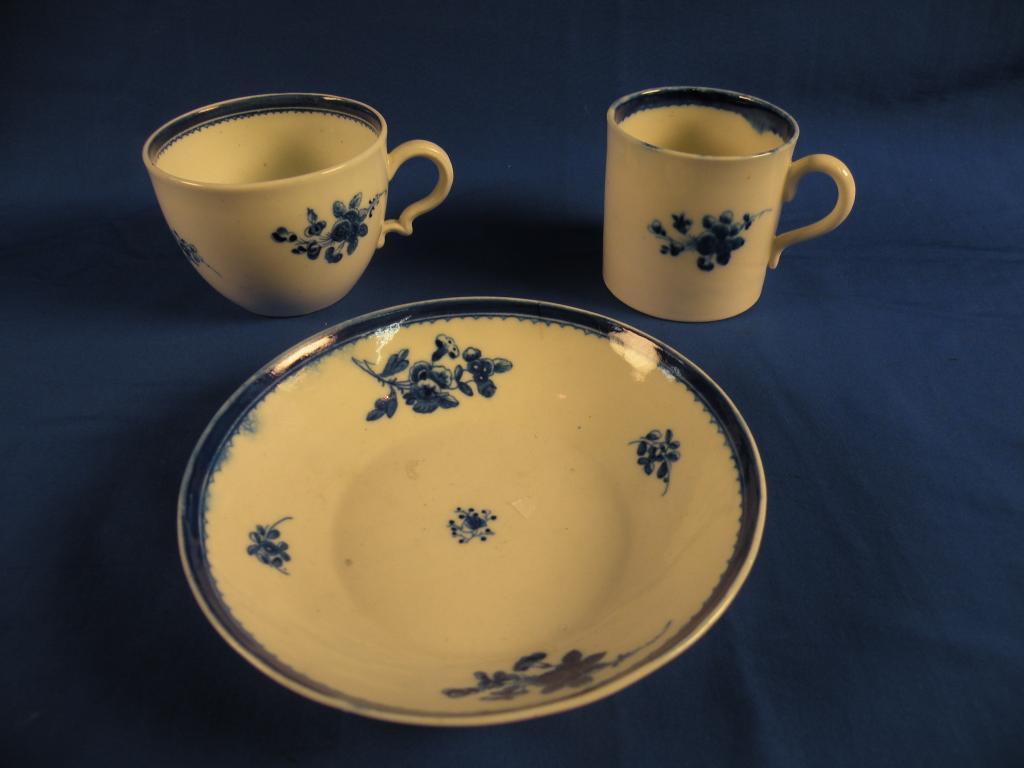 Appraisal: An thC Caughley coffee cup and saucer printed in underglaze