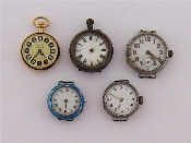 Appraisal: A group of watches including a nickel trench watch with