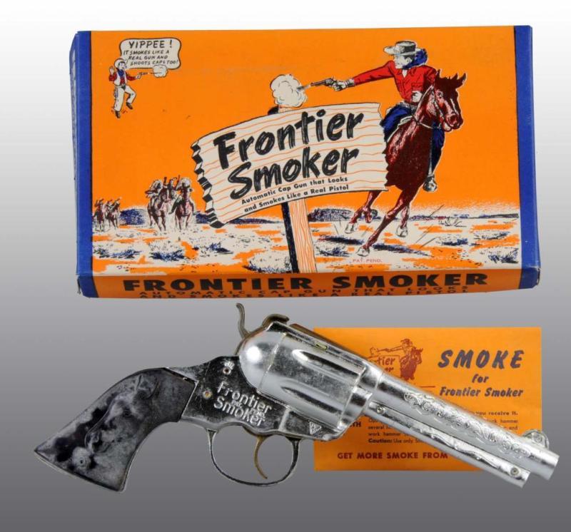 Appraisal: Frontier Smoker Toy Cap Gun Description Store Stock Includes original