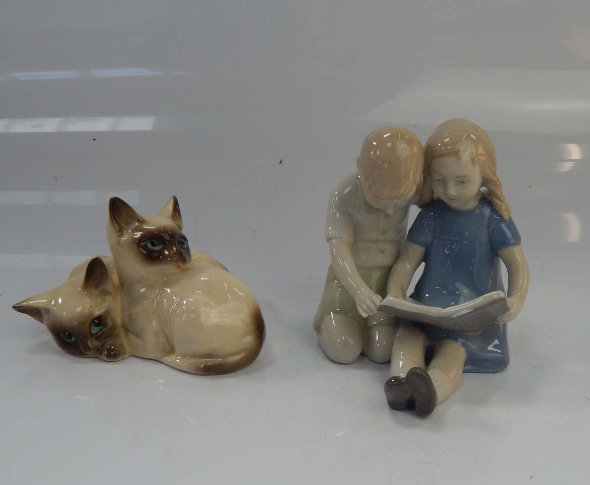 Appraisal: A Royal Doulton figure of Siamese cats and a Copenhagen