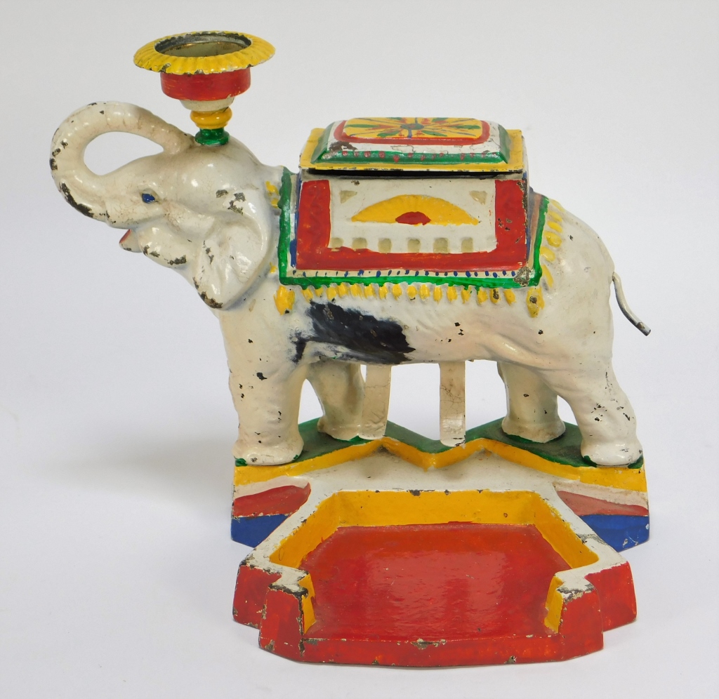 Appraisal: POLYCHROME CAST IRON ELEPHANT CIGARETTE DISPENSER United States Early th