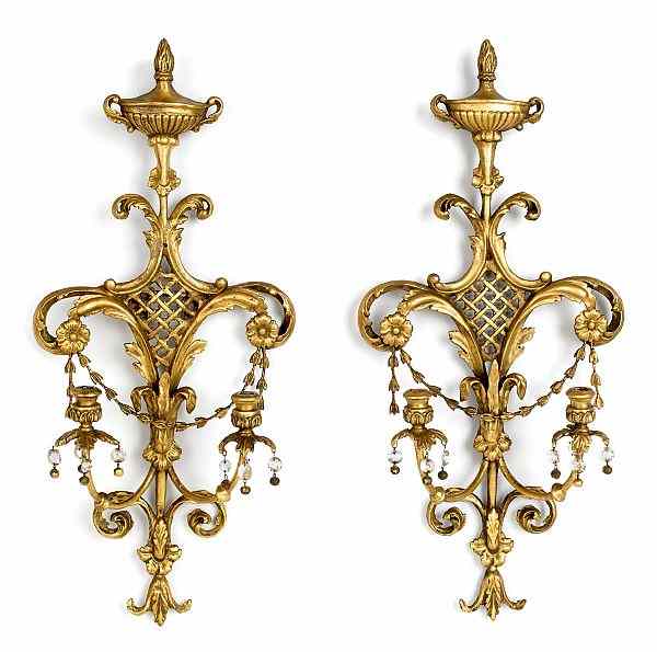 Appraisal: Pair of Continental carved and gilded wall sconces th c