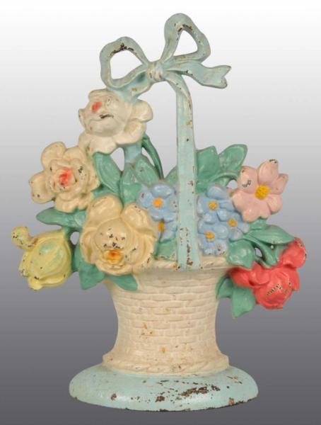 Appraisal: Cast Iron Rose Basket Doorstop Description Made by Hubley cat