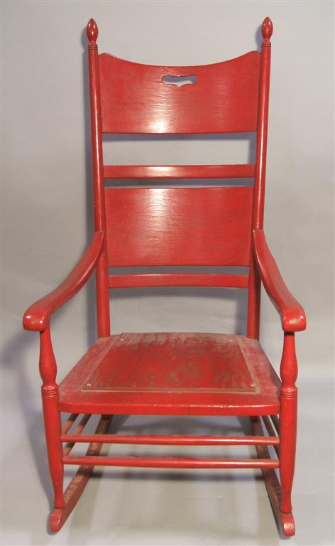 Appraisal: RED PAINTED COUNTRY STYLE ROCKING CHAIR the tall back with