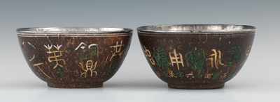 Appraisal: A Pair of Chinese Silver-Lined Coconut Cups Carved coconut cups