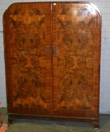 Appraisal: An Art Deco walnut wardrobe cm wide cm deep cm