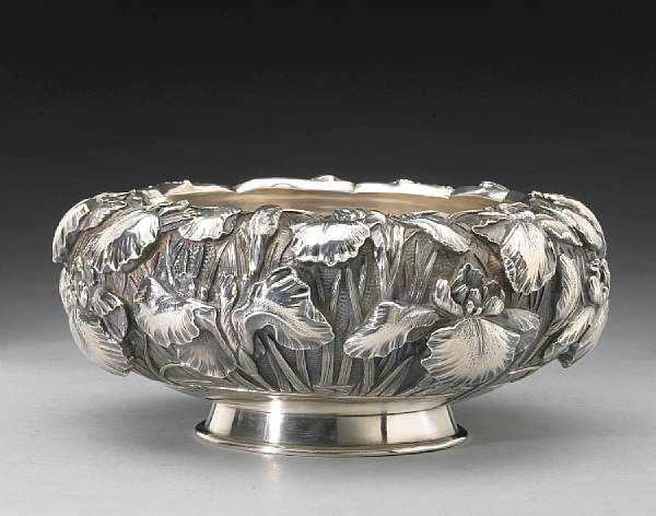 Appraisal: A silver repouss circular bowl Meiji Period Of double wall