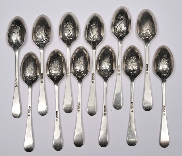 Appraisal: A SET OF TWELVE EDWARDIAN SILVER HANOVARIAN AND SHELL PATTERN