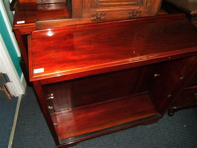 Appraisal: A pair of low mahogany bookcases each with two adjustable