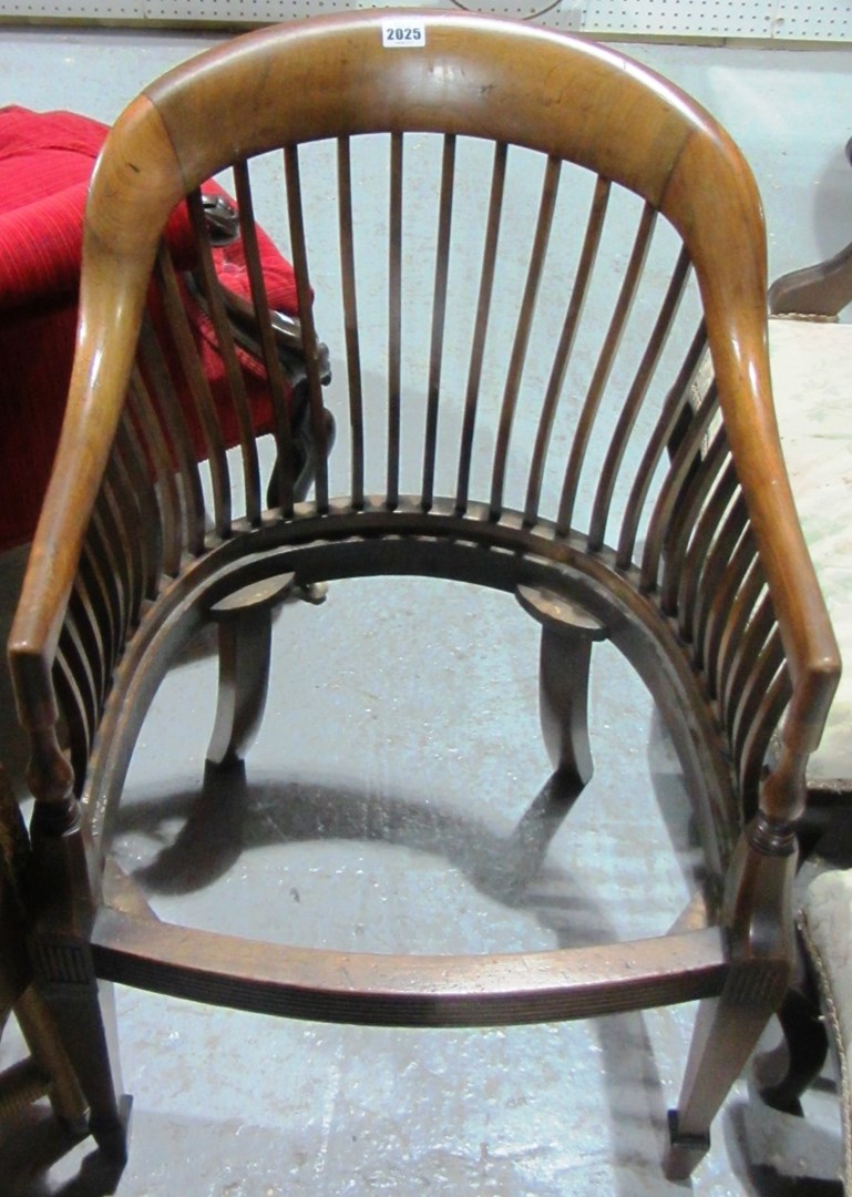 Appraisal: A th century mahogany tub back armchair