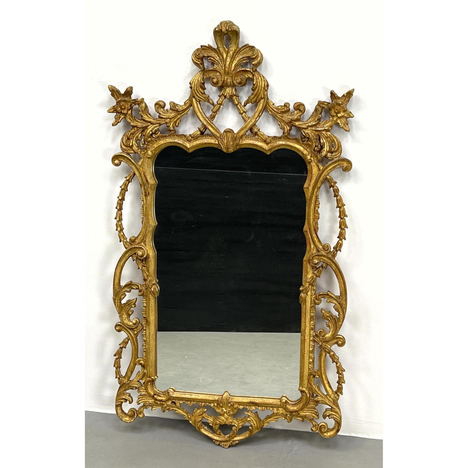 Appraisal: Italian Gilt Carved Wood Framed Mirror Highly decorative frame Made