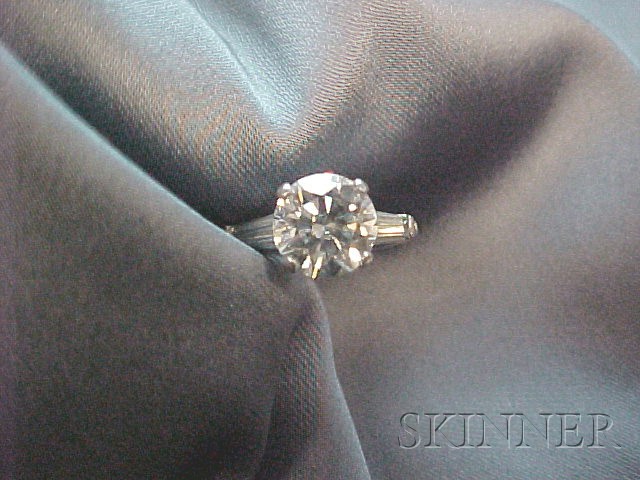 Appraisal: Platinum and Diamond Solitaire prong-set with a full-cut diamond weighing