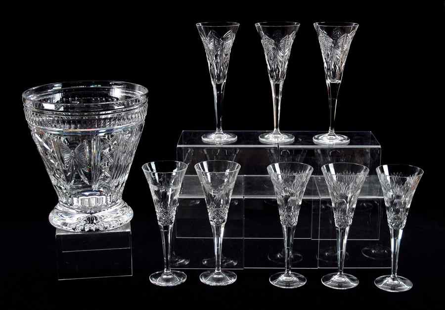 Appraisal: WATERFORD CRYSTAL MILLENNIUM CHAMPAGNE FLUTES AND ICE BUCKET champagne flutes