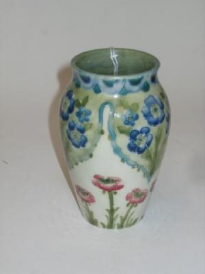 Appraisal: A MACINTYRE MOORCROFT POTTERY VASE of baluster form tube lined