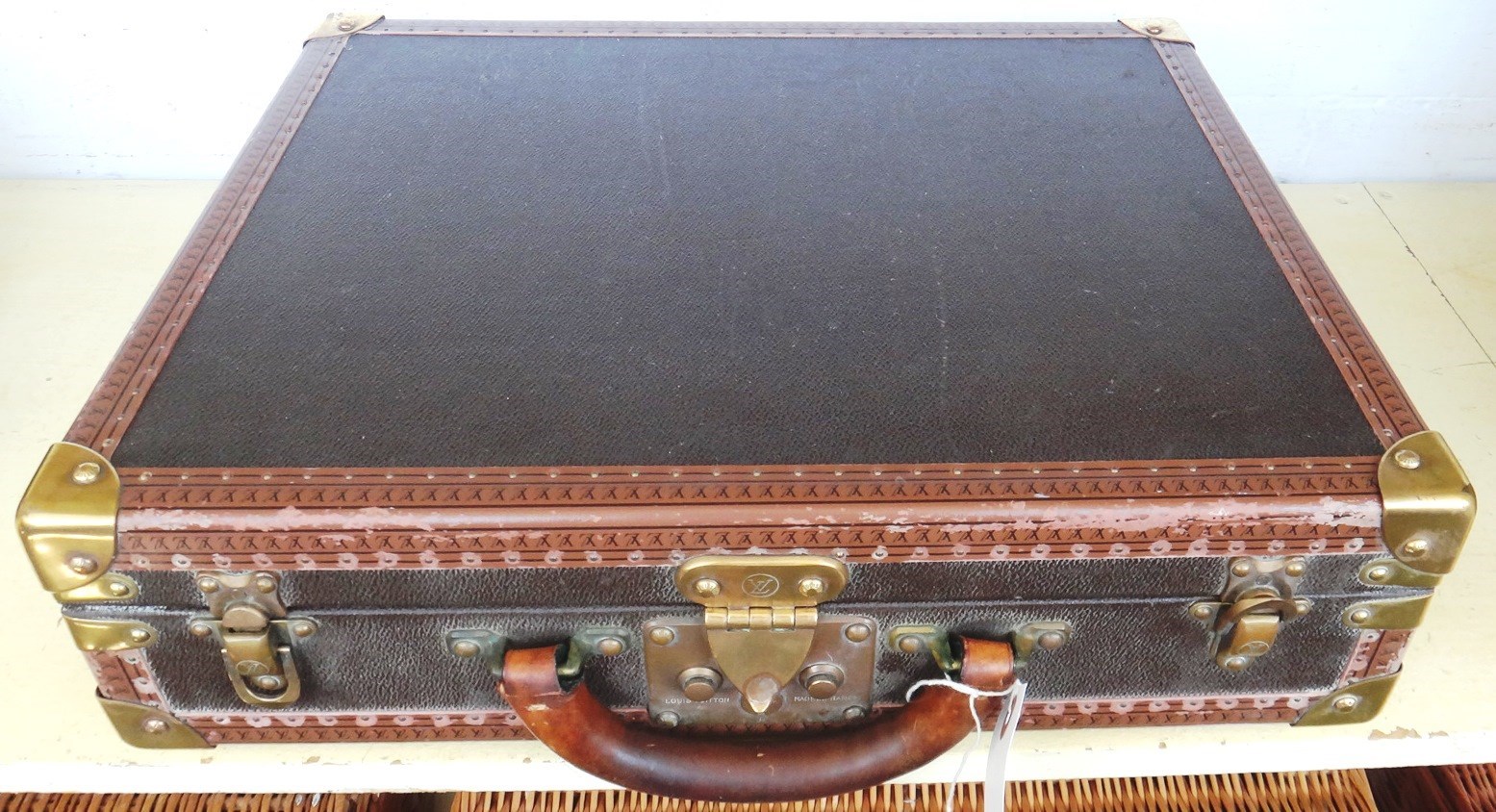 Appraisal: A Louis Vuitton briefcase late th century leather bound with