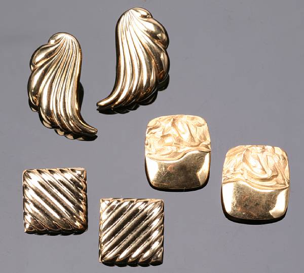 Appraisal: A collection of gold ear clips and a lapel pin