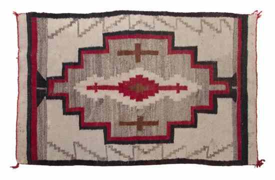 Appraisal: A Navajo Blanket having a center medallion with red black