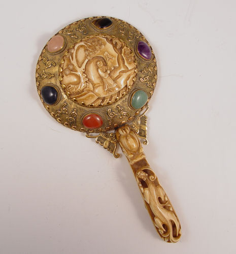 Appraisal: CHINESE IVORY GOLD PLATE HAND MIRROR WITH CABOCHONS Figural dragon