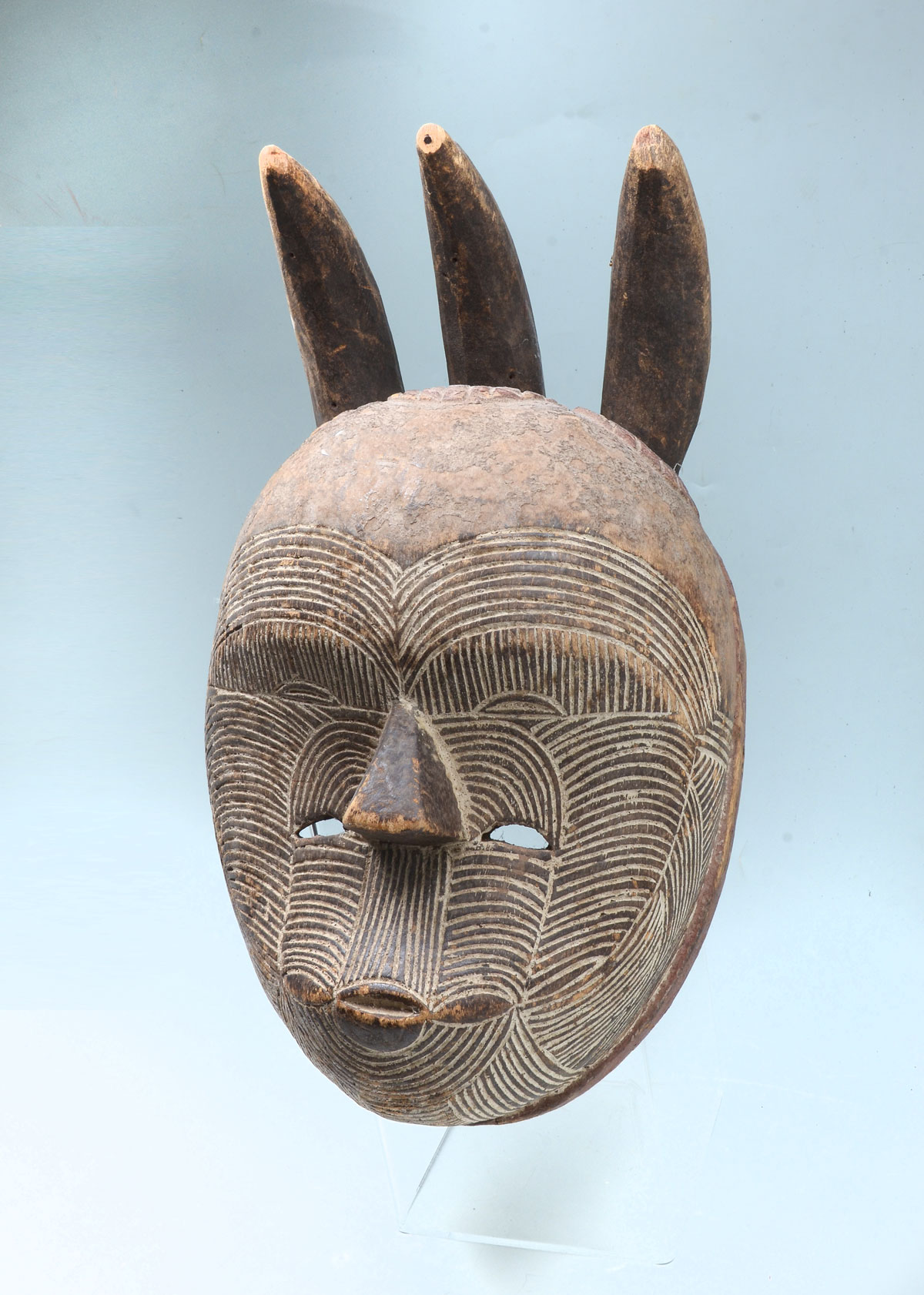 Appraisal: AFRICAN HORNED MASK African ritual mask having surmounting horns with