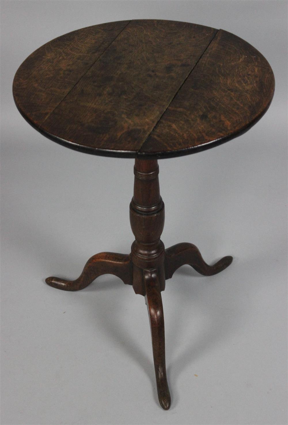 Appraisal: GEORGIAN OAK SMALL TEA CANDLESTAND the English oak candlestand with