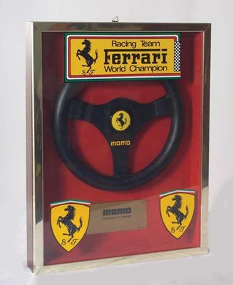 Appraisal: A Volant Formula One Ferrari steering wheel manufactured by Momo