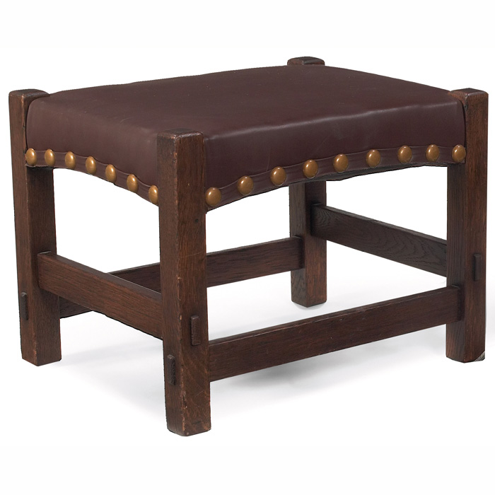 Appraisal: Gustav Stickley footstool recovered leather seat with an arched rail