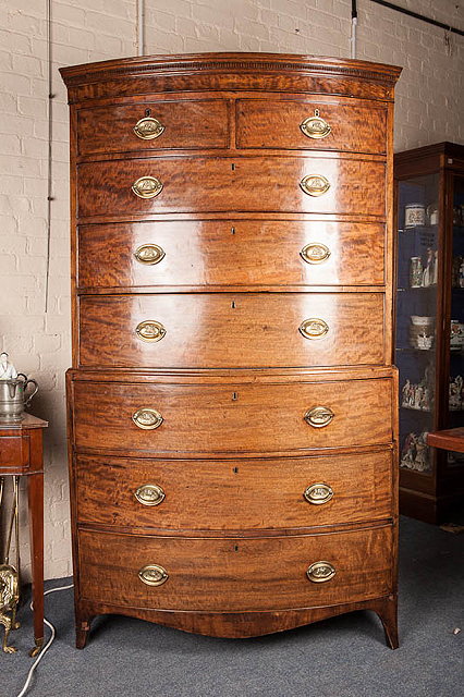 Appraisal: A TH CENTURY MAHOGANY BOW FRONTED CHEST ON CHEST the