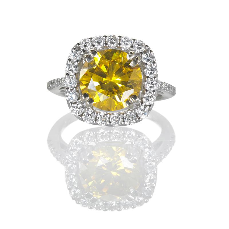 Appraisal: FANCY YELLOW AND COLORLESS DIAMOND RING Condition Report Beautiful ring