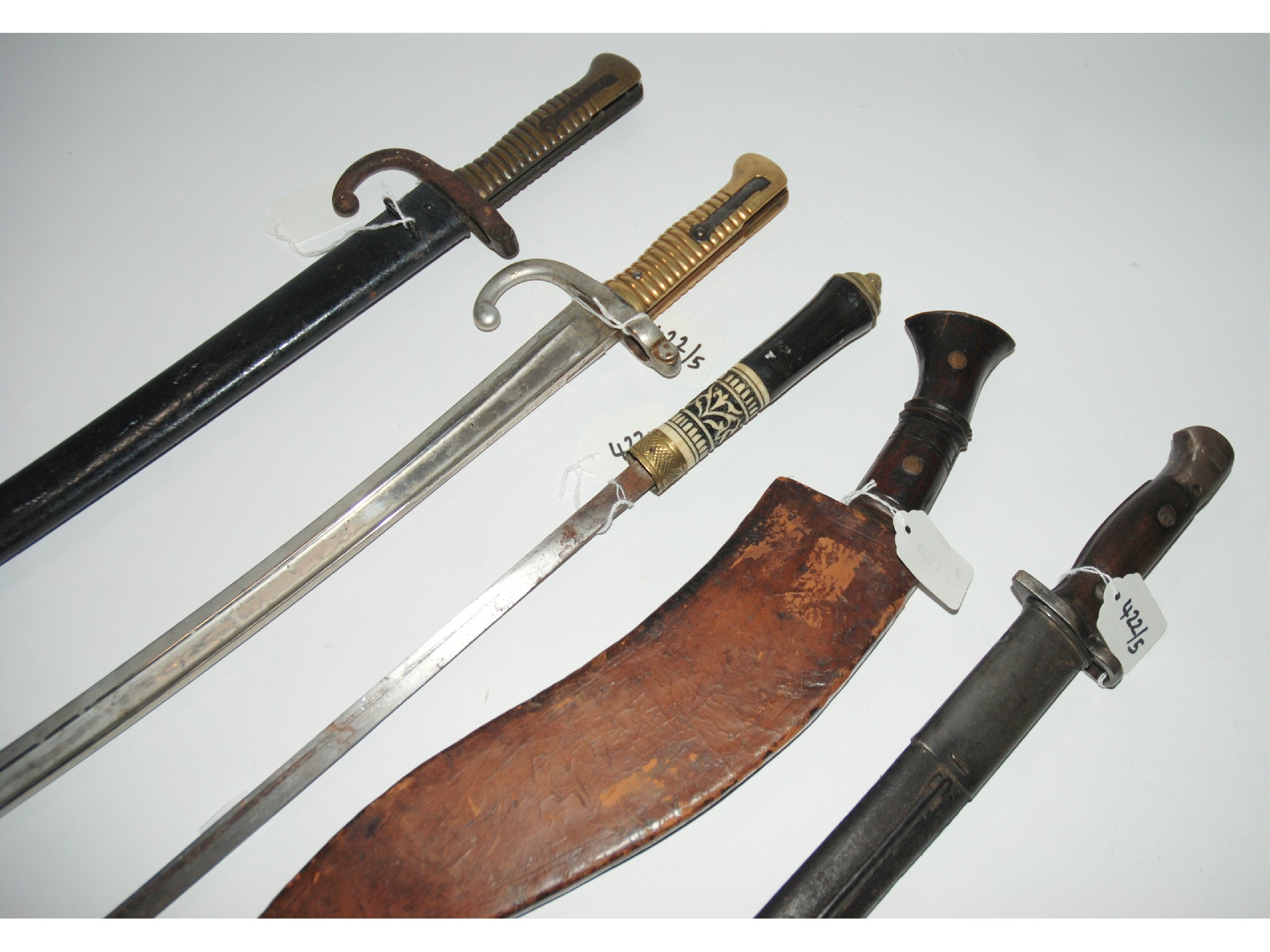 Appraisal: Three various bayonets two with scabbards a kukri and Middle