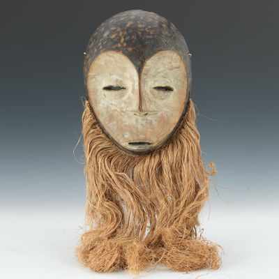 Appraisal: Bwami Mask Lega People Congo Carved oval wood mask with