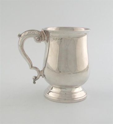 Appraisal: A modern baluster mug on a tiered foot scroll handle