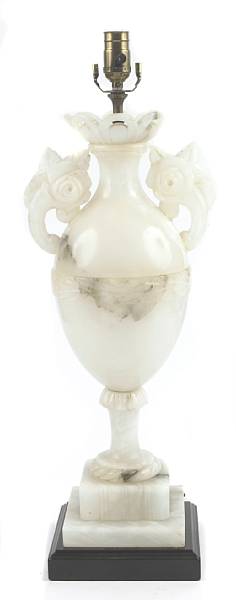 Appraisal: A carved alabaster table lamp height in