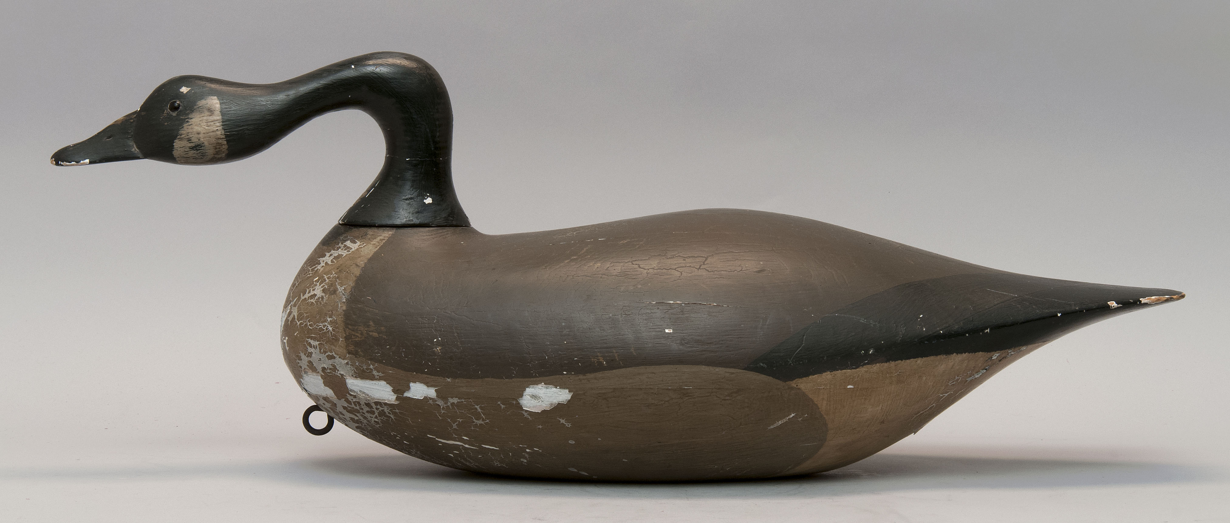 Appraisal: CANADA GOOSE DECOY ContemporaryMaker unknown Hollow-carved Head in reaching position