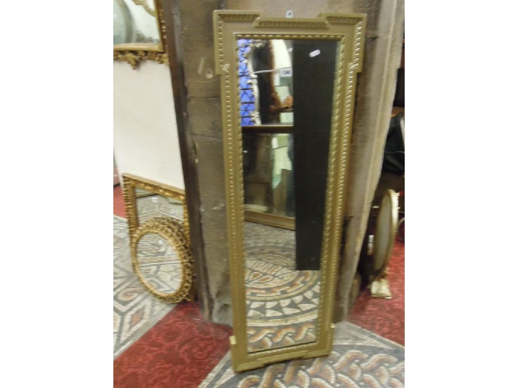 Appraisal: A gilt framed wall mirror of rectangular form with floral