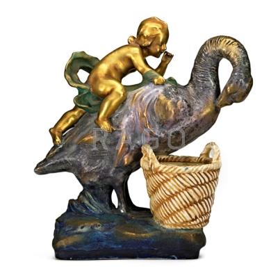 Appraisal: RIESSNER STELLMACHER KESSEL Tall figure of putto riding a goose