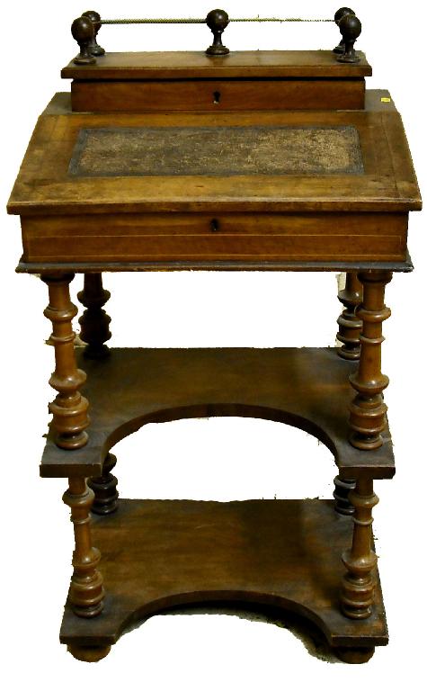 Appraisal: th century walnut Davenport the galleried top hinged to reveal